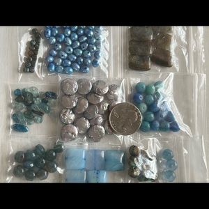 Assortment of gemstone, glass and pearl beads in blue shades